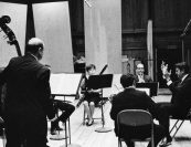 “I remember that first night that I came to Marlboro, when these players were giving their all to this very difficult work of Roger Sessions, the Viola Quintet, and the feeling of finding in this place, in the middle of a forest, five individuals working so concentratedly and so unbelievably lovingly over this very, very difficult work. That picture was the picture of Marlboro.” —Leon Kirchner | Kirchner, Henry Nowak, Joyce Kelley, Harold Wright, Jaime Laredo, and Julius Levine rehearse Stravinsky’s “Histoire du Soldat” in 1967. Photo by J. M. Snyder.