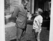 In the spring of 1929, the Menuhin family attended a Busch Quartet concert in Berlin. 13-year-old Yehudi introduced himself to Busch by playing him a Bach partita. Soon after, Busch assumed a lead role in Menuhin's musical education, imposing a certain rigor, including daily duo work with pianist Hubert Giesen, while also ensuring the young prodigy takes time for soccer, badminton, and other youthful activities. | Busch with Yehudi Menuhin in Basel, 1929.